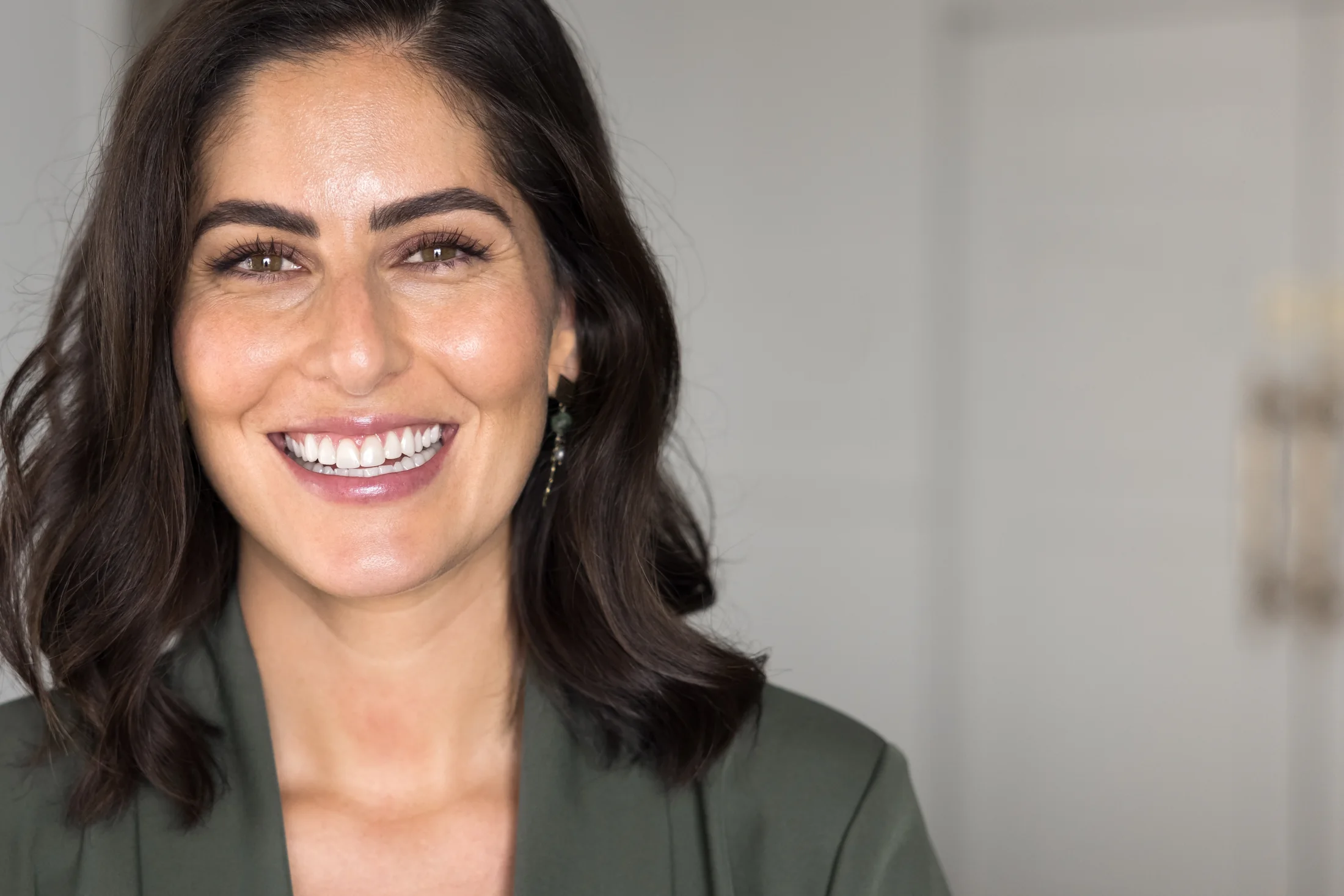 Smiling dental patient served by Personal Care Dentistry