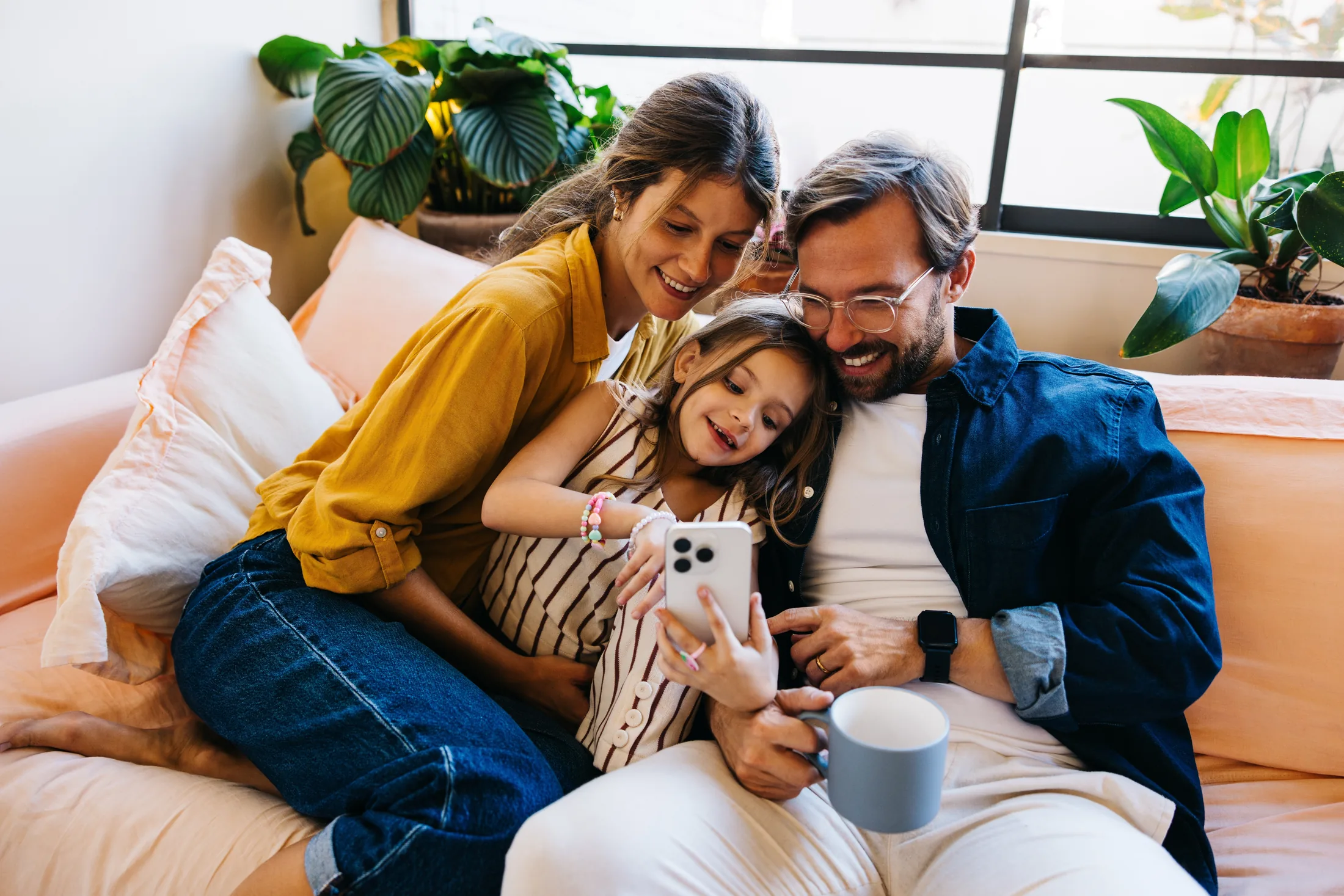 A smiling family relaxing together